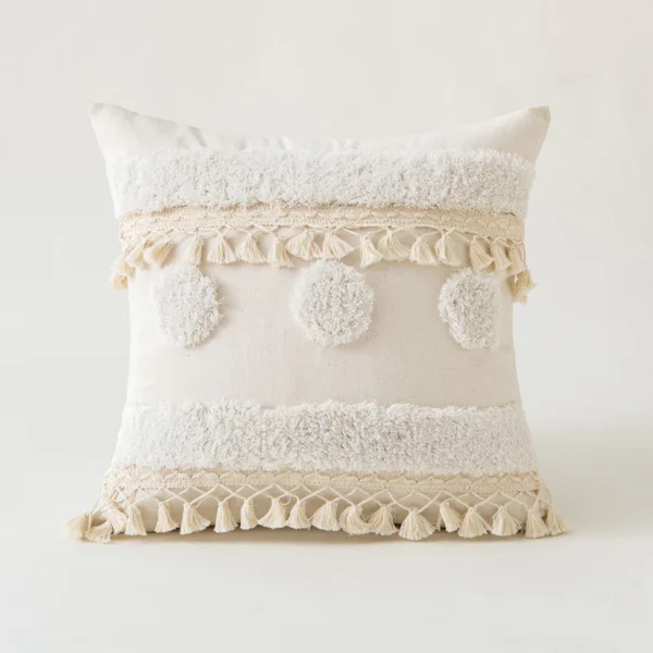 Housse de coussin bohème Patagonia, coussin texturé écru avec pompons et franges